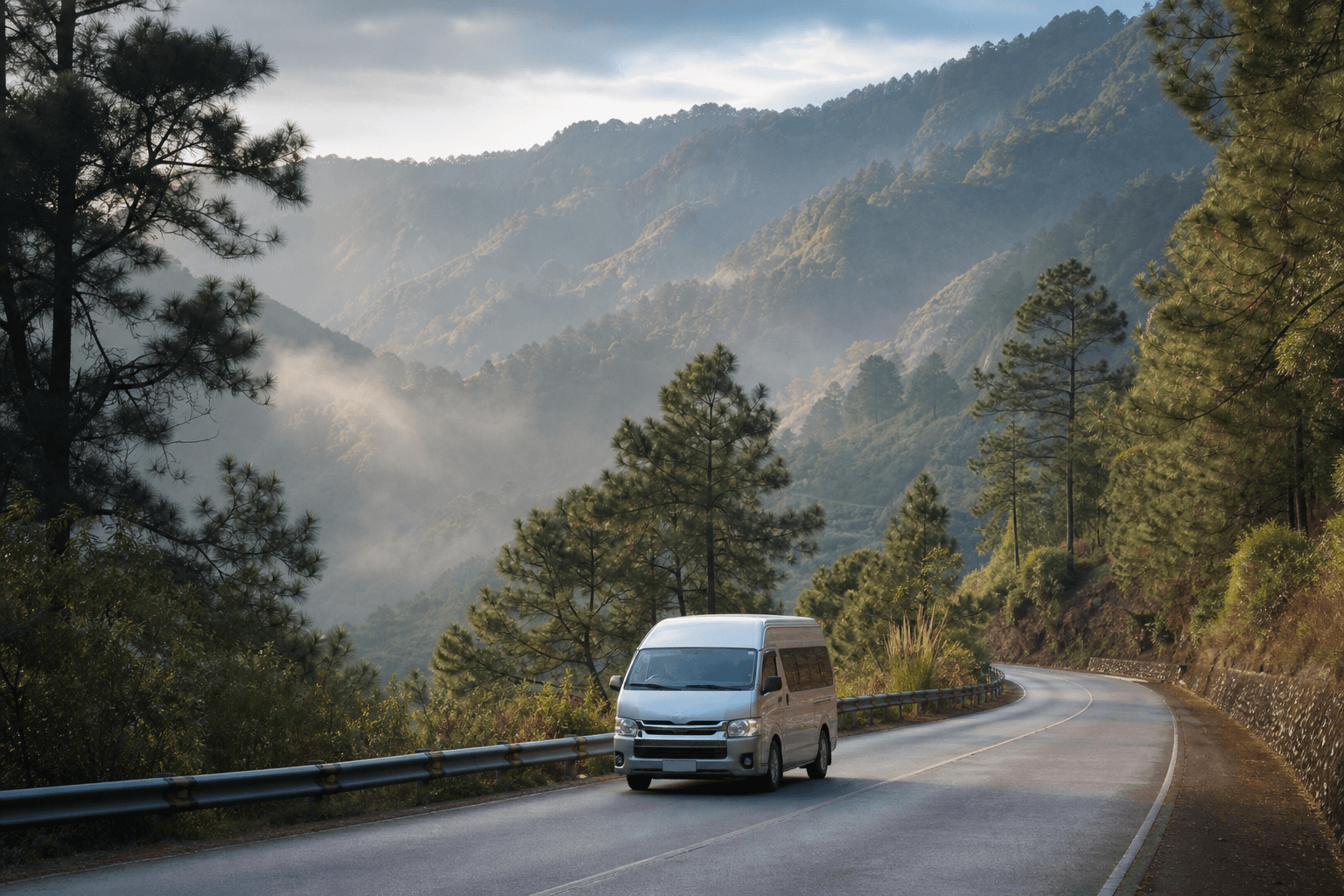 Pine-covered mountain road towards Baguio